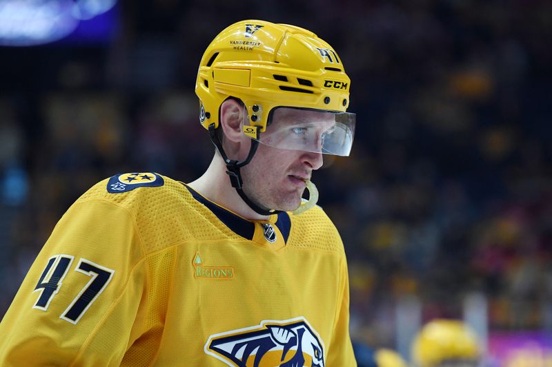 Mar 23, 2024; Nashville, Tennessee, USA; Nashville Predators right wing Michael McCarron (47) skates in for a face off during the third period against the Detroit Red Wings at Bridgestone Arena. Mandatory Credit: Christopher Hanewinckel-USA TODAY Sports