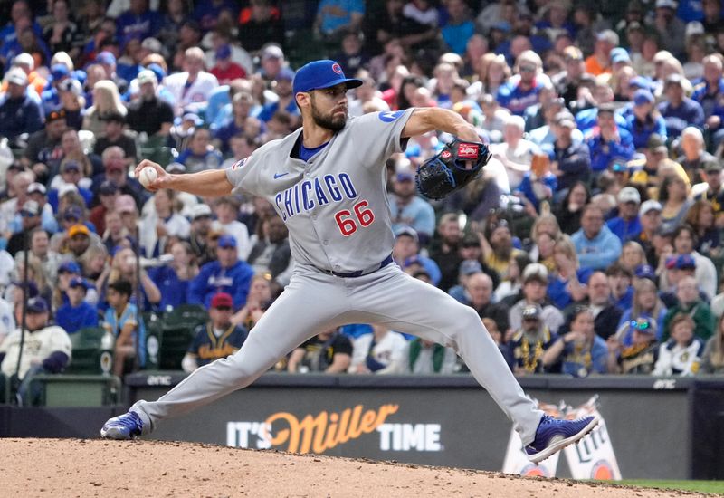 May 4, 2025; Milwaukee, Wisconsin, USA; Chicago Cubs pitcher Julian Merryweather (66) delivers a pitch against the Milwaukee Brewers in the sixth inning at American Family Field. Mandatory Credit: Michael McLoone-Imagn Images
