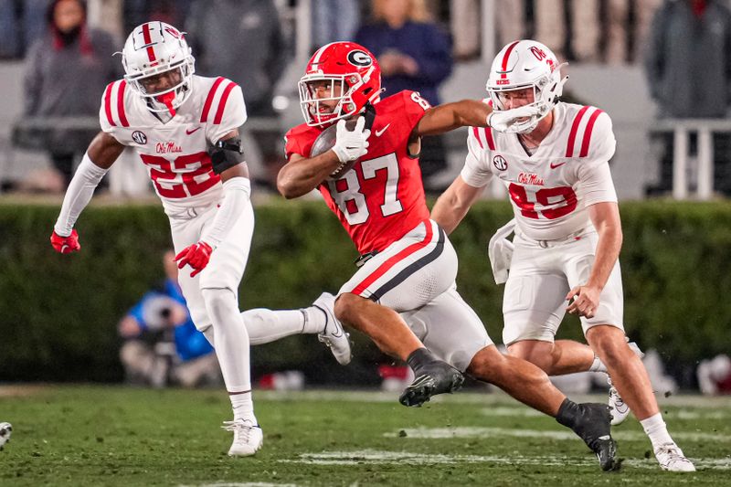 Nov 11, 2023; Athens, Georgia, USA; A Georgia Bulldogs wide receiver Mekhi Mews (87) returns a punt against the Mississippi Rebels during the second half at Sanford Stadium. Mandatory Credit: Dale Zanine-USA TODAY Sports