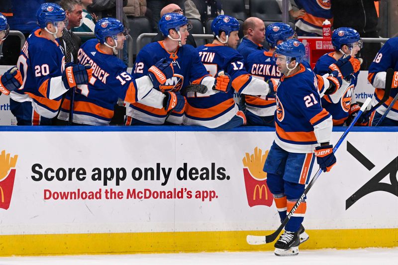 Mar 23, 2024; Elmont, New York, USA;  New York Islanders center Kyle Palmieri (21) celebrates his goal against the Winnipeg Jets during the first period at UBS Arena. Mandatory Credit: Dennis Schneidler-USA TODAY Sports