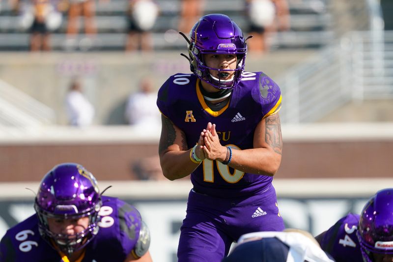 Oct 17, 2020; Greenville, North Carolina, USA;  East Carolina Pirates quarterback Mason Garcia (10) gets ready for the snap against the Navy Midshipmen during the second half at Dowdy-Ficklen Stadium. Mandatory Credit: James Guillory-USA TODAY Sports