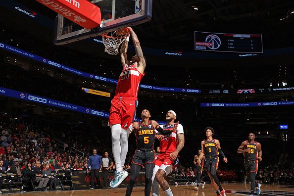 WASHINGTON, DC -? DECEMBER 31: Kyle Kuzma #33 of the Washington Wizards dunks the ball during the game against the Atlanta Hawks on December 31, 2023 at Capital One Arena in Washington, DC. NOTE TO USER: User expressly acknowledges and agrees that, by downloading and or using this Photograph, user is consenting to the terms and conditions of the Getty Images License Agreement. Mandatory Copyright Notice: Copyright 2023 NBAE (Photo by Stephen Gosling/NBAE via Getty Images)