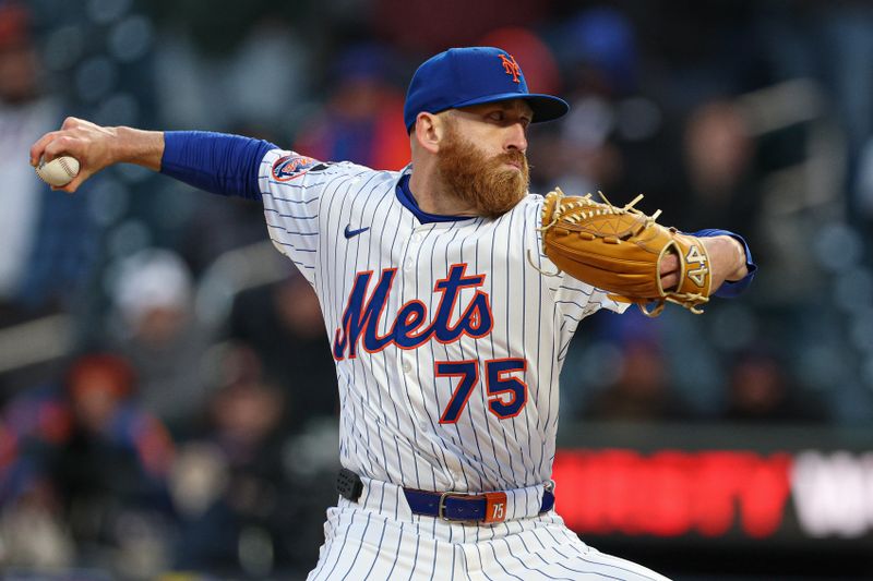 Apr 8, 2025; New York City, New York, USA; New York Mets relief pitcher Reed Garrett (75) delivers a pitch during the ninth inning against the Miami Marlins at Citi Field. Mandatory Credit: Vincent Carchietta-Imagn Images