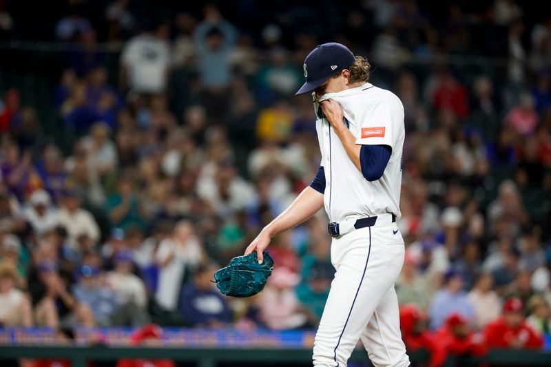 Sep 10, 2025; Seattle, Washington, USA; Seattle Mariners starting pitcher Logan Gilbert (36) walks to the dugout after being relieved for against the St. Louis Cardinals during the fifth inning at T-Mobile Park. Mandatory Credit: Joe Nicholson-Imagn Images
