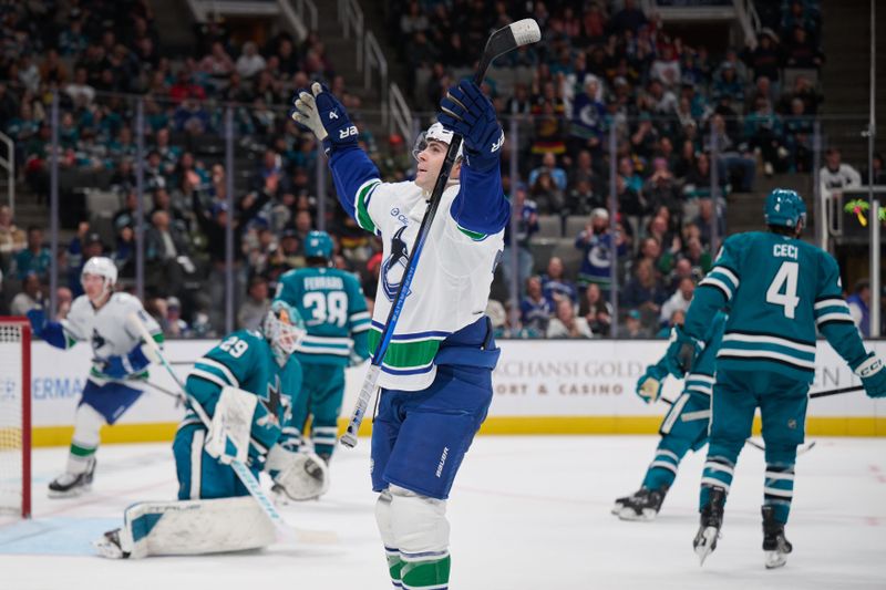 Nov 2, 2024; San Jose, California, USA; Vancouver Canucks left wing Jake DeBrusk (74) reacts after scoring a goal against the San Jose Sharks during the third period at SAP Center at San Jose. Mandatory Credit: Robert Edwards-Imagn Images