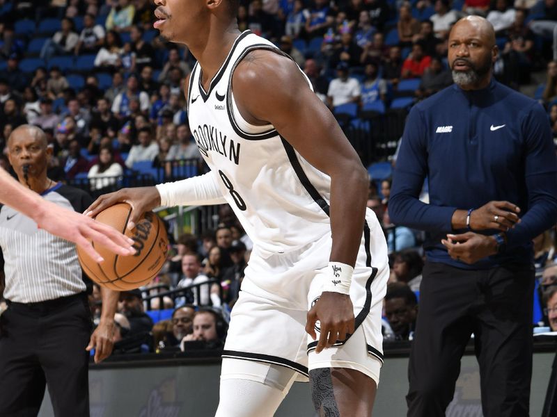 ORLANDO, FL - FEBRUARY 27: Lonnie Walker IV #8 of the Brooklyn Nets dribbles the ball during the game against the Orlando Magic on February 27, 2024 at the Kia Center in Orlando, Florida. NOTE TO USER: User expressly acknowledges and agrees that, by downloading and or using this photograph, User is consenting to the terms and conditions of the Getty Images License Agreement. Mandatory Copyright Notice: Copyright 2024 NBAE (Photo by Fernando Medina/NBAE via Getty Images)