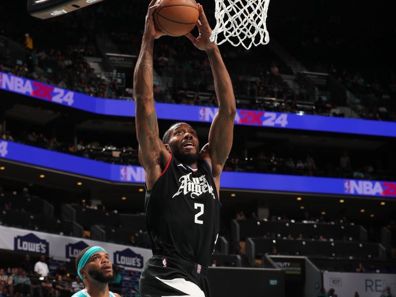 CHARLOTTE, NC - MARCH 31: Kawhi Leonard #2 of the LA Clippers dunks the ball during the game against the Charlotte Hornets on March 31, 2024 at Spectrum Center in Charlotte, North Carolina. NOTE TO USER: User expressly acknowledges and agrees that, by downloading and or using this photograph, User is consenting to the terms and conditions of the Getty Images License Agreement. Mandatory Copyright Notice: Copyright 2024 NBAE (Photo by Kent Smith/NBAE via Getty Images)