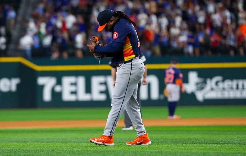 Aug 6, 2024; Arlington, Texas, USA; Houston Astros starting pitcher Framber Valdez (59) reacts after giving up a two-run home run to Texas Rangers shortstop Corey Seager (not pictured) during the ninth inning at Globe Life Field. Mandatory Credit: Kevin Jairaj-USA TODAY Sports