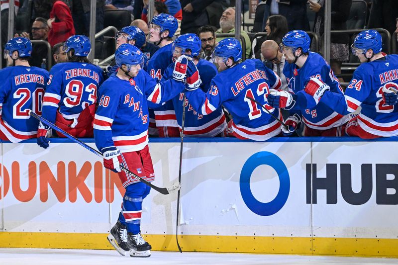 Nov 7, 2024; New York, New York, USA;  New York Rangers left wing Will Cuylle (50) celebrates his goal against the Buffalo Sabres during the third period at Madison Square Garden. Mandatory Credit: Dennis Schneidler-Imagn Images