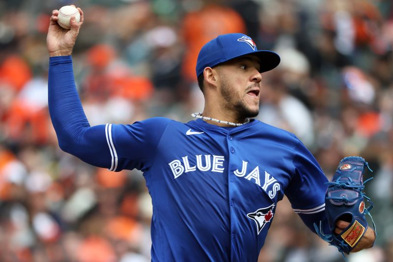 Apr 13, 2025; Baltimore, Maryland, USA; Toronto Blue Jays pitcher José Berríos (17) throws the ball during the third inning against the Baltimore Orioles at Oriole Park at Camden Yards. Mandatory Credit: Daniel Kucin Jr.-Imagn Images