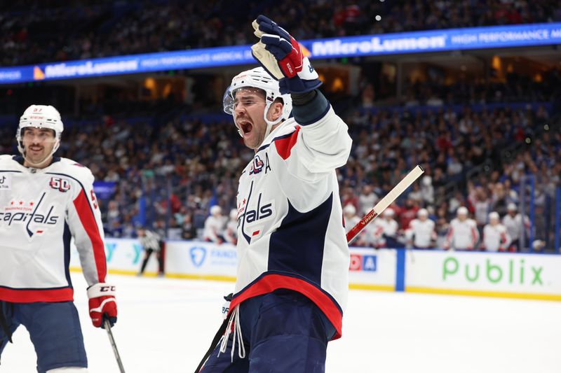 Nov 27, 2024; Tampa, Florida, USA; Washington Capitals right wing Tom Wilson (43) celebrates after center Aliaksei Protas (21) (not pictured) scores against the Tampa Bay Lightning during the second period at Amalie Arena. Mandatory Credit: Kim Klement Neitzel-Imagn Images