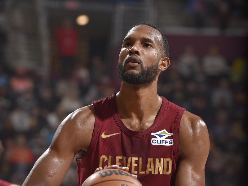 CLEVELAND, OH - JANUARY 5: Evan Mobley #4 of the Cleveland Cavaliers prepares to shoot a free throw during the game against the Charlotte Hornets on January 5, 2025 at Rocket Mortgage FieldHouse in Cleveland, Ohio. NOTE TO USER: User expressly acknowledges and agrees that, by downloading and/or using this Photograph, user is consenting to the terms and conditions of the Getty Images License Agreement. Mandatory Copyright Notice: Copyright 2025 NBAE (Photo by David Liam Kyle/NBAE via Getty Images)