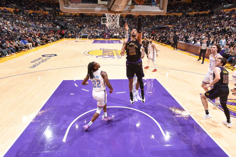 LOS ANGELES, CA - JANUARY 15:  Christian Wood #35 of the Los Angeles Lakers goes to the basket during the game on January 15, 2024 at Crypto.Com Arena in Los Angeles, California. NOTE TO USER: User expressly acknowledges and agrees that, by downloading and/or using this Photograph, user is consenting to the terms and conditions of the Getty Images License Agreement. Mandatory Copyright Notice: Copyright 2024 NBAE (Photo by Andrew D. Bernstein/NBAE via Getty Images)