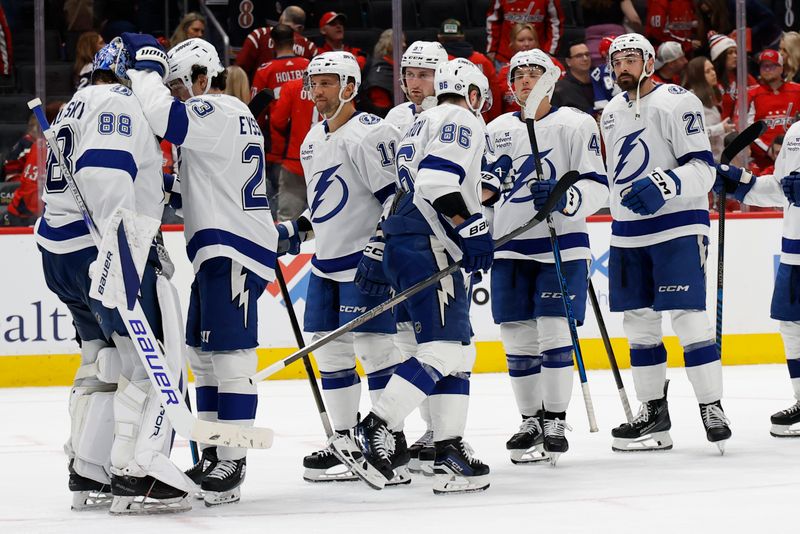 Mar 1, 2025; Washington, District of Columbia, USA; Tampa Bay Lightning goaltender Andrei Vasilevskiy (88) celebrates with teammates after their game against the Washington Capitals at Capital One Arena. Mandatory Credit: Geoff Burke-Imagn Images