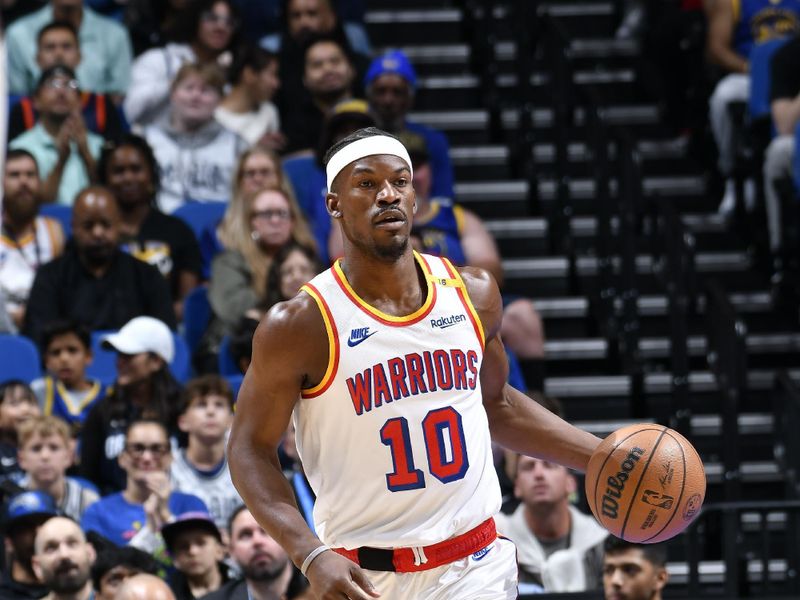 ORLANDO, FL - FEBRUARY 27:  Jimmy Butler #10 of the Golden State Warriors dribbles the ball during the game against the Orlando Magic on February 27, 2025 at Kia Center in Orlando, Florida. NOTE TO USER: User expressly acknowledges and agrees that, by downloading and or using this photograph, User is consenting to the terms and conditions of the Getty Images License Agreement. Mandatory Copyright Notice: Copyright 2025 NBAE (Photo by Fernando Medina/NBAE via Getty Images)