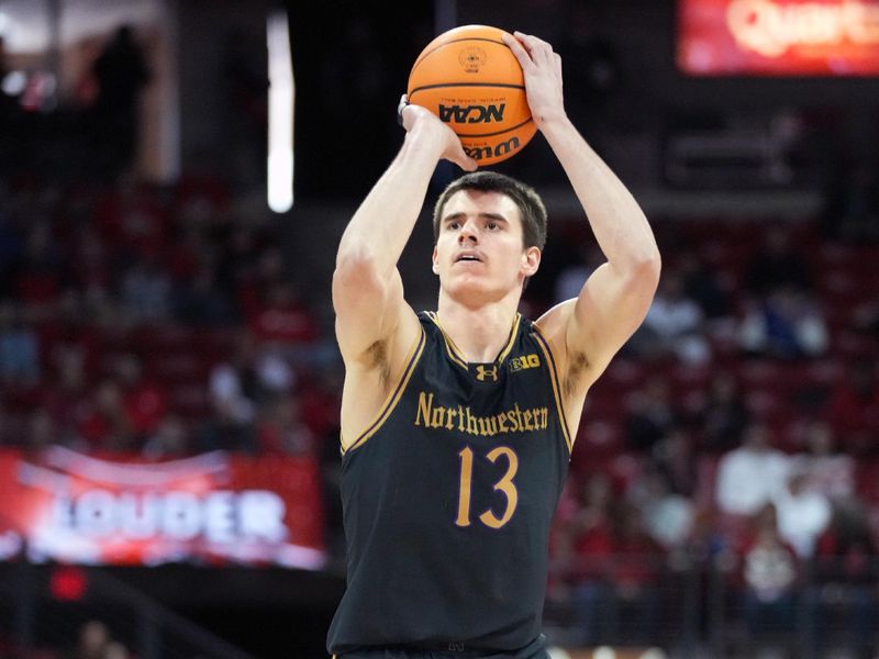 Jan 13, 2024; Madison, Wisconsin, USA; Northwestern Wildcats guard Brooks Barnhizer (13) attempts a three point basket against the Wisconsin Badgers during the first half at the Kohl Center. Mandatory Credit: Kayla Wolf-USA TODAY Sports