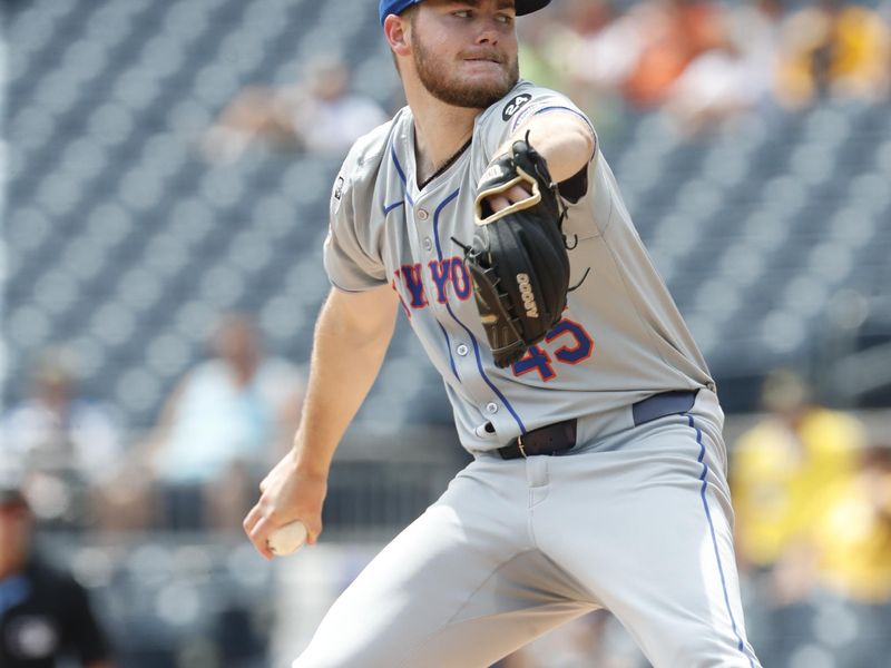 Jul 8, 2024; Pittsburgh, Pennsylvania, USA;  New York Mets starting pitcher Christian Scott (45) delivers a pitch against the Pittsburgh Pirates during the first inning  at PNC Park. Mandatory Credit: Charles LeClaire-USA TODAY Sports