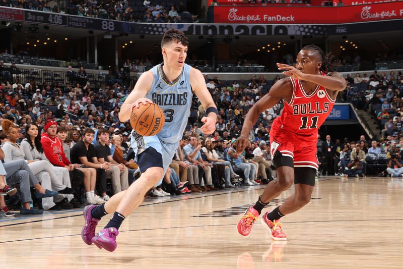 MEMPHIS, TN - OCTOBER 28: Jake LaRavia #3 of the Memphis Grizzlies drives to the basket during the game against the Chicago Bulls on October 28, 2024 at FedExForum in Memphis, Tennessee. NOTE TO USER: User expressly acknowledges and agrees that, by downloading and or using this photograph, User is consenting to the terms and conditions of the Getty Images License Agreement. Mandatory Copyright Notice: Copyright 2024 NBAE (Photo by Joe Murphy/NBAE via Getty Images)