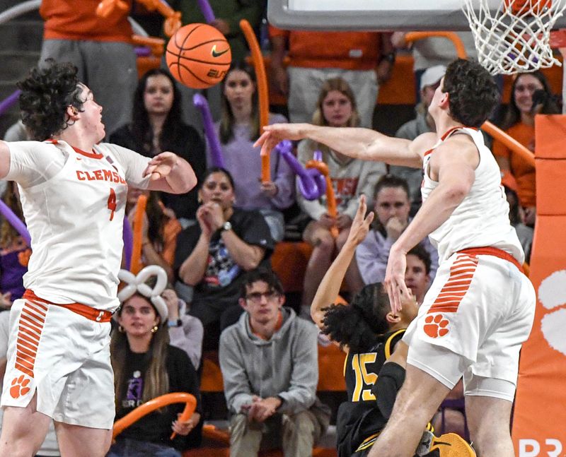 Feb 27, 2024; Clemson, South Carolina, USA; Clemson junior forward PJ Hall (24) blocks a shot by Pitt guard Jaland Lowe (15) during the second half at Littlejohn Coliseum. Mandatory Credit: Ken Ruinard-USA TODAY Sports