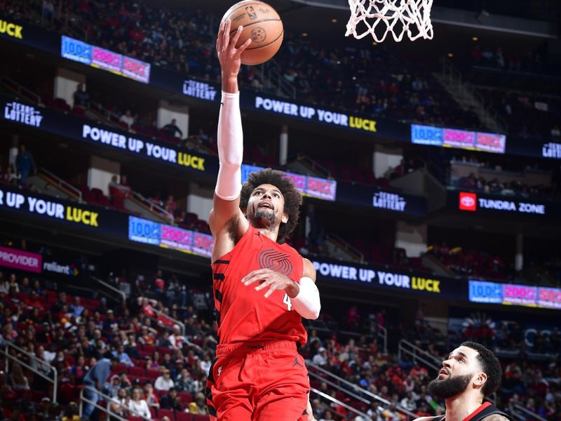 HOUSTON, TX - JANUARY 24: Matisse Thybulle #4 of the Portland Trail Blazers drives to the basket during the game against the Houston Rockets on January 24, 2024 at the Toyota Center in Houston, Texas. NOTE TO USER: User expressly acknowledges and agrees that, by downloading and or using this photograph, User is consenting to the terms and conditions of the Getty Images License Agreement. Mandatory Copyright Notice: Copyright 2024 NBAE (Photo by Logan Riely/NBAE via Getty Images)