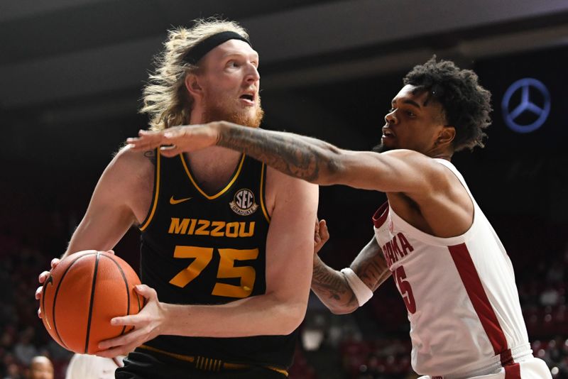 Jan 16, 2024; Tuscaloosa, Alabama, USA; Missouri center Connor Vanover (75) secures a rebound against Alabama guard Aaron Estrada at Coleman Coliseum. Mandatory Credit: Gary Cosby Jr.-USA TODAY Sports