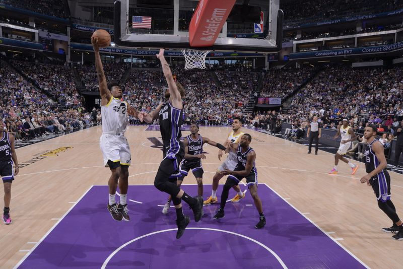 SACRAMENTO, CA - MARCH 31: Colin Sexton #2 of the Utah Jazz drives to the basket during the game against the Sacramento Kings on March 31, 2024 at Golden 1 Center in Sacramento, California. NOTE TO USER: User expressly acknowledges and agrees that, by downloading and or using this Photograph, user is consenting to the terms and conditions of the Getty Images License Agreement. Mandatory Copyright Notice: Copyright 2024 NBAE (Photo by Rocky Widner/NBAE via Getty Images)