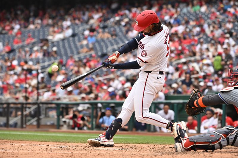 Jul 4, 2024; Washington, District of Columbia, USA; Washington Nationals left fielder Jesse Winker (6) hits a home run against the New York Mets during the eighth inning at Nationals Park. Mandatory Credit: Rafael Suanes-USA TODAY Sports