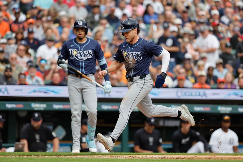 Sep 26, 2024; Detroit, Michigan, USA;  Tampa Bay Rays shortstop Taylor Walls (6) scores a run on a wild pitch in the fifth inning against the Detroit Tigers at Comerica Park. Mandatory Credit: Rick Osentoski-Imagn Images