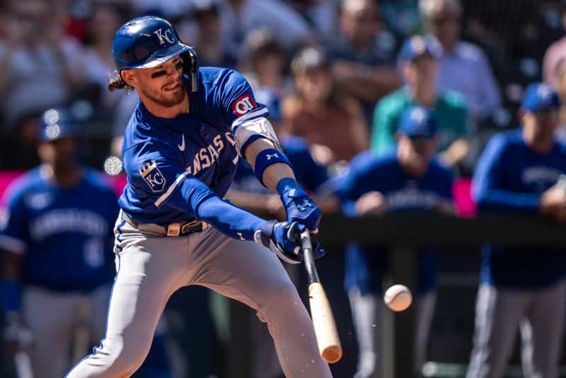 May 15, 2024; Seattle, Washington, USA; Kansas City Royals shortstop Bobby Witt Jr. (7) hits a RBI-ground out during the eighth inning of a game against the Seattle Mariners at T-Mobile Park. Mandatory Credit: Stephen Brashear-USA TODAY Sports