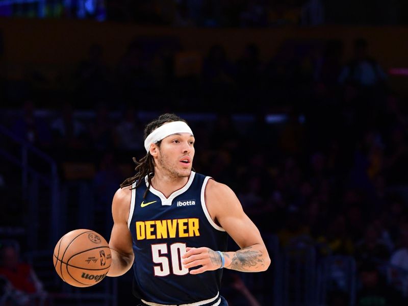 LOS ANGELES, CA - APRIL 27: Aaron Gordon #50 of the Denver Nuggets dribbles the ball during the game against the Los Angeles Lakers during Round 1 Game 4 of the 2024 NBA Playoffs on April 27, 2024 at Crypto.Com Arena in Los Angeles, California. NOTE TO USER: User expressly acknowledges and agrees that, by downloading and/or using this Photograph, user is consenting to the terms and conditions of the Getty Images License Agreement. Mandatory Copyright Notice: Copyright 2024 NBAE (Photo by Adam Pantozzi/NBAE via Getty Images)