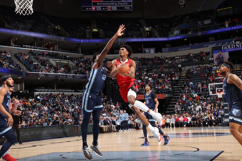 MEMPHIS, TN - FEBRUARY 14: Amen Thompson #1 of the Houston Rockets drives to the basket during the game against the Memphis Grizzlies on February 14, 2024 at FedExForum in Memphis, Tennessee. NOTE TO USER: User expressly acknowledges and agrees that, by downloading and or using this photograph, User is consenting to the terms and conditions of the Getty Images License Agreement. Mandatory Copyright Notice: Copyright 2024 NBAE (Photo by Joe Murphy/NBAE via Getty Images)