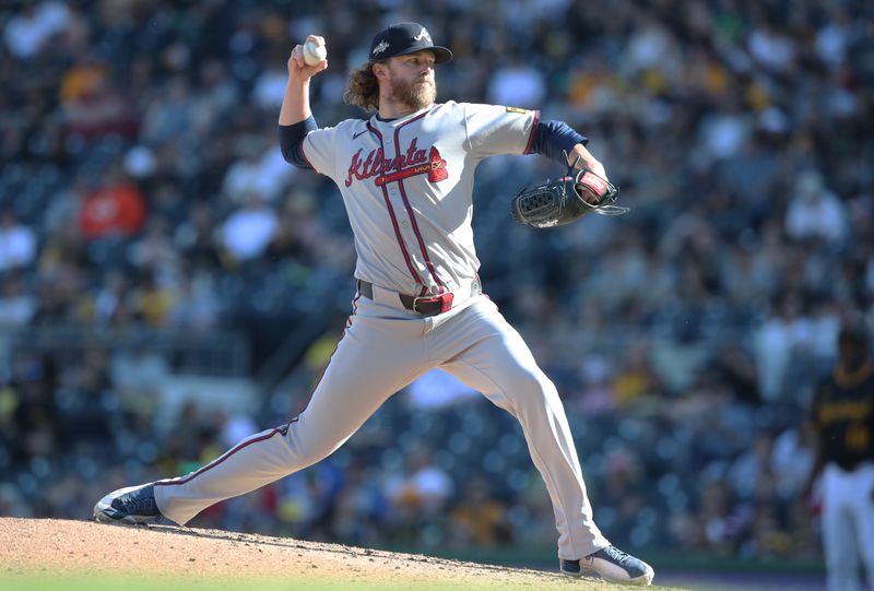 May 10, 2025; Pittsburgh, Pennsylvania, USA;  Atlanta Braves relief pitcher Pierce Johnson (38) pitches against  the Pittsburgh Pirates during the sixth inning at PNC Park. Mandatory Credit: Charles LeClaire-Imagn Images