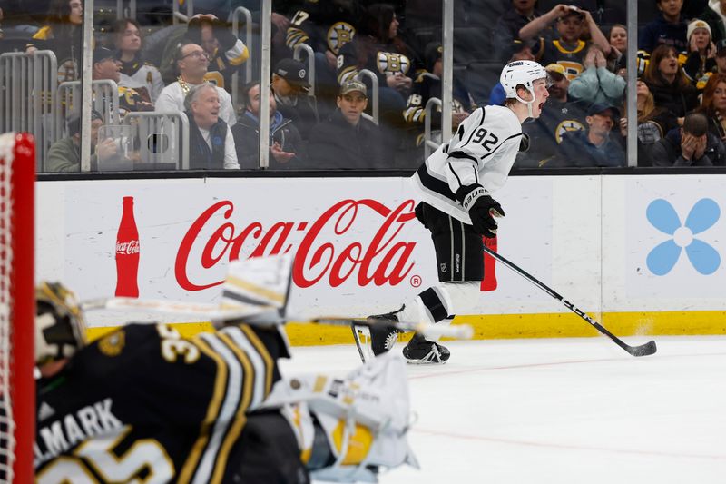 Feb 17, 2024; Boston, Massachusetts, USA; Los Angeles Kings defenseman Brandt Clarke (92) celebrates his game winning goal in overtime that defeated the Boston Bruins 5-4 at TD Garden. Mandatory Credit: Winslow Townson-USA TODAY Sports