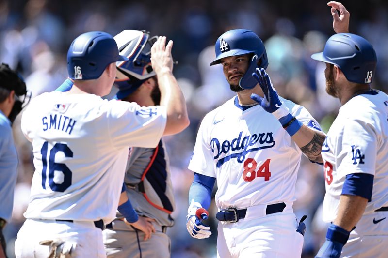 Apr 21, 2024; Los Angeles, California, USA; Los Angeles Dodgers outfielder Andy Pages (84) celebrates with teammates after hitting a home run against the New York Mets during the fifth inning at Dodger Stadium. Mandatory Credit: Jonathan Hui-USA TODAY Sports