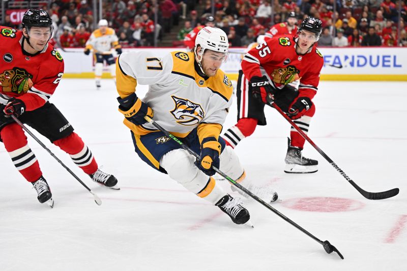 Apr 12, 2024; Chicago, Illinois, USA; Nashville Predators forward Mark Jankowski (17) controls the puck in the third period against the Chicago Blackhawks at United Center. Mandatory Credit: Jamie Sabau-USA TODAY Sports