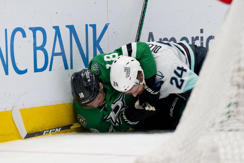 May 15, 2023; Dallas, Texas, USA; Dallas Stars center Max Domi (18) and Seattle Kraken defenseman Jamie Oleksiak (24) get tangles up on the ice during the second period in game seven of the second round of the 2023 Stanley Cup Playoffs at the American Airlines Center. Mandatory Credit: Jerome Miron-USA TODAY Sports