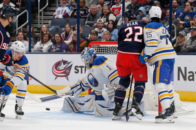 Feb 23, 2024; Columbus, Ohio, USA; Buffalo Sabres goalie Ukko-Pekka Luukkonen (1) makes a pad save against the Columbus Blue Jackets during the first period at Nationwide Arena. Mandatory Credit: Russell LaBounty-USA TODAY Sports