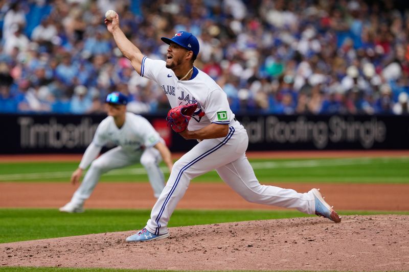 Jul 30, 2023; Toronto, Ontario, CAN; Toronto Blue Jays pitcher Jose Berrios (17) pitches to the Los Angeles Angels during the fourth inning at Rogers Centre. Mandatory Credit: John E. Sokolowski-USA TODAY Sports