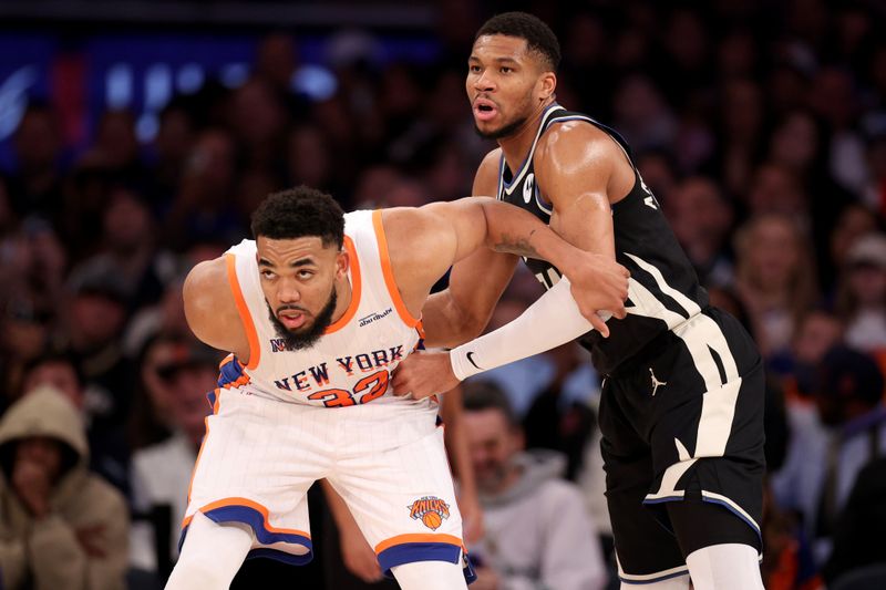 NEW YORK, NEW YORK - JANUARY 12: Karl-Anthony Towns #32 of the New York Knicks boxes out Giannis Antetokounmpo #34 of the Milwaukee Bucks during the second half at Madison Square Garden on January 12, 2025 in New York City. NOTE TO USER: User expressly acknowledges and agrees that, by downloading and or using this photograph, User is consenting to the terms and conditions of the Getty Images License Agreement. (Photo by Evan Bernstein/Getty Images)