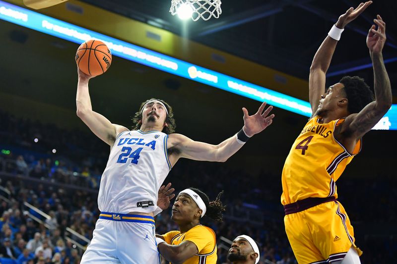 Mar 2, 2023; Los Angeles, California, USA; UCLA Bruins guard Jaime Jaquez Jr. (24) dunks for the basket against Arizona State Sun Devils guard Desmond Cambridge Jr. (4) during the second half at Pauley Pavilion. Mandatory Credit: Gary A. Vasquez-USA TODAY Sports