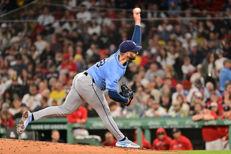 Sep 27, 2024; Boston, Massachusetts, USA;  Tampa Bay Rays pitcher Colin Poche (38) pitches against the Boston Red Sox during the seventh inning at Fenway Park. Mandatory Credit: Eric Canha-Imagn Images