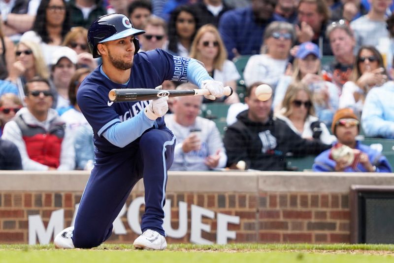 Jun 16, 2023; Chicago, Illinois, USA; Chicago Cubs third baseman Nick Madrigal (1) lays down a sacrifice bunt against the Baltimore Orioles during the sixth inning at Wrigley Field. Mandatory Credit: David Banks-USA TODAY Sports