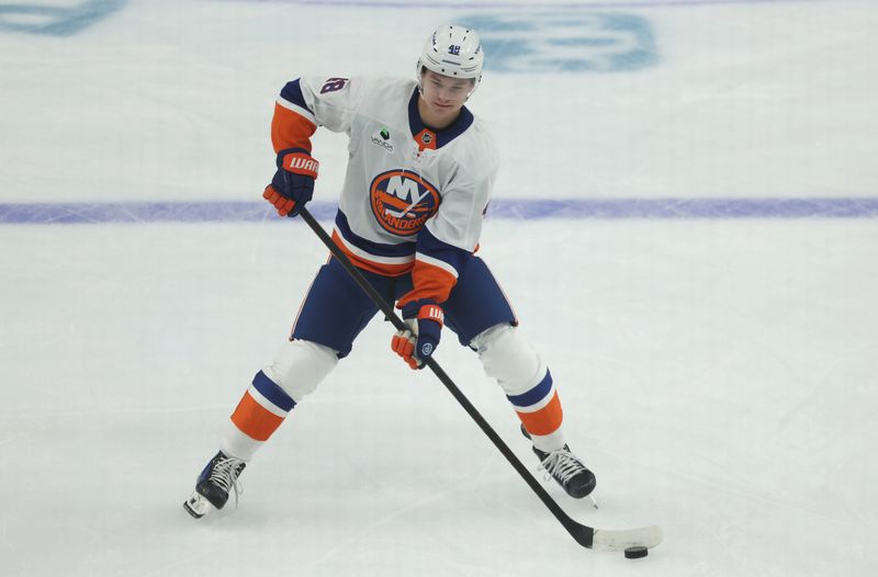 Oct 9, 2025; Pittsburgh, Pennsylvania, USA;  New York Islanders defenseman Matthew Schaefer (48) warms up  before making his NHL debut against the Pittsburgh Penguins at PPG Paints Arena. Mandatory Credit: Charles LeClaire-Imagn Images