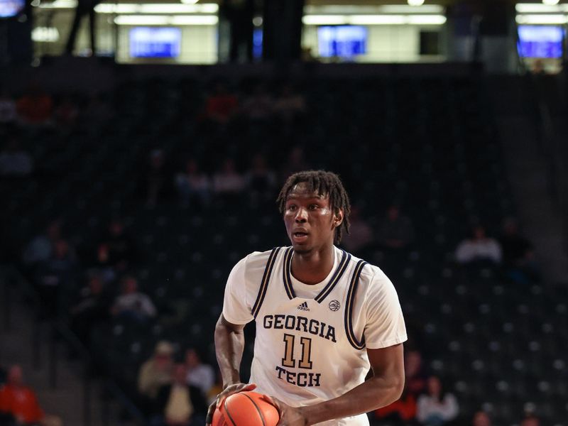 Jan 14, 2025; Atlanta, Georgia, USA; Georgia Tech Yellow Jackets forward Baye Ndongo (11) during the game against the Clemson Tigers during the first half at McCamish Pavilion. Mandatory Credit: Jordan Godfree-Imagn Images