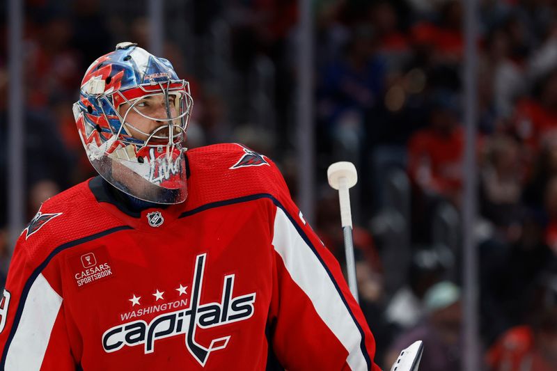 Apr 28, 2024; Washington, District of Columbia, USA; Washington Capitals goaltender Charlie Lindgren (79) stands on the ice during a timeout against the New York Rangers in the second period in game four of the first round of the 2024 Stanley Cup Playoffs at Capital One Arena. Mandatory Credit: Geoff Burke-USA TODAY Sports