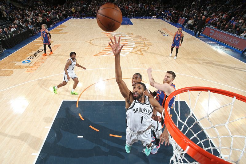 NEW YORK, NY - MARCH 23: Mikal Bridges #1 of the Brooklyn Nets rebounds during the game against the New York Knicks on March 23, 2024 at Madison Square Garden in New York City, New York.  NOTE TO USER: User expressly acknowledges and agrees that, by downloading and or using this photograph, User is consenting to the terms and conditions of the Getty Images License Agreement. Mandatory Copyright Notice: Copyright 2024 NBAE  (Photo by Nathaniel S. Butler/NBAE via Getty Images)