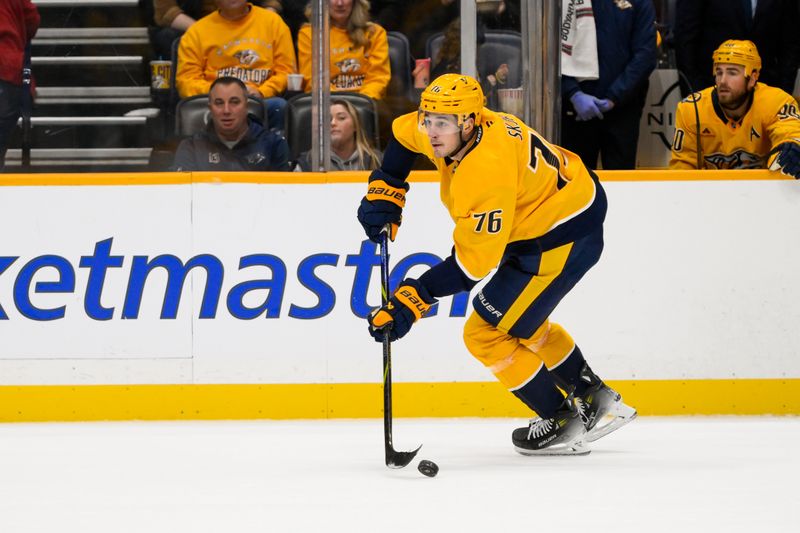 Nov 29, 2024; Nashville, Tennessee, USA;  Nashville Predators defenseman Brady Skjei (76) skates with the puck against the Tampa Bay Lightning during the second period at Bridgestone Arena. Mandatory Credit: Steve Roberts-Imagn Images