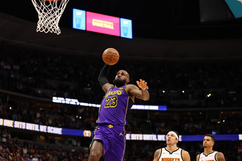 DENVER, CO - FEBRUARY 22: LeBron James #23 of the Los Angeles Lakers dunks the ball during the game against the Denver Nuggets on February 22, 2025 at Ball Arena in Denver, Colorado. NOTE TO USER: User expressly acknowledges and agrees that, by downloading and/or using this Photograph, user is consenting to the terms and conditions of the Getty Images License Agreement. Mandatory Copyright Notice: Copyright 2025 NBAE (Photo by Jamie Schwaberow/NBAE via Getty Images)