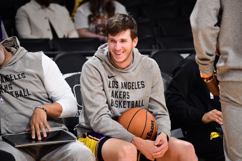 LOS ANGELES, CA - MARCH 8: Austin Reaves #15 of the Los Angeles Lakers warms up before the game against the Milwaukee Bucks on March 8, 2024 at Crypto.Com Arena in Los Angeles, California. NOTE TO USER: User expressly acknowledges and agrees that, by downloading and/or using this Photograph, user is consenting to the terms and conditions of the Getty Images License Agreement. Mandatory Copyright Notice: Copyright 2024 NBAE (Photo by Adam Pantozzi/NBAE via Getty Images)