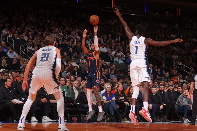 NEW YORK, NY - DECEMBER 3: Cameron Payne #1 of the New York Knicks shoots a three point basket during the game  against the Orlando Magic during the Emirates NBA Cup on December 3, 2024 at Madison Square Garden in New York City, New York.  NOTE TO USER: User expressly acknowledges and agrees that, by downloading and or using this photograph, User is consenting to the terms and conditions of the Getty Images License Agreement. Mandatory Copyright Notice: Copyright 2024 NBAE  (Photo by Nathaniel S. Butler/NBAE via Getty Images)